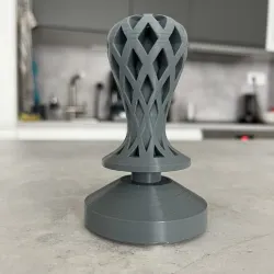 Depth adjustable tamper