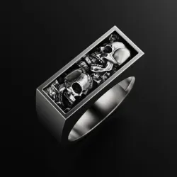 Ring with two buried skulls