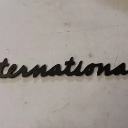 International Script emblem badge