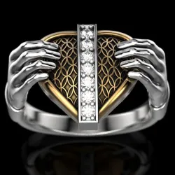 Ring hands hold heart