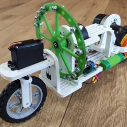 Self balancing bike with reaction wheel