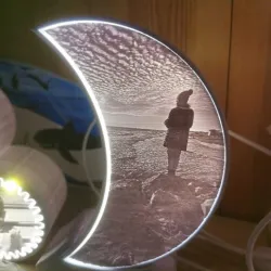 A moon shape base for lithophane lamp