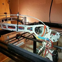 3D printer with cross kinematics with 120g direct extruder, Nema 14 stepper and ball-bearing print head on carbon shafts
