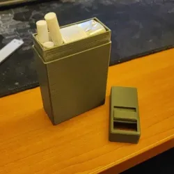 Cigarette pack holder with closer