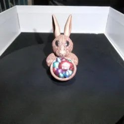 Easter Bunny with Easter eggs in a basket