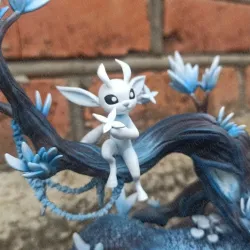 Ori sitting on a tree