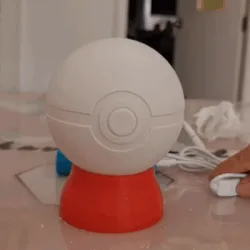 Pikachu sleeping in a Pokeball Night Light