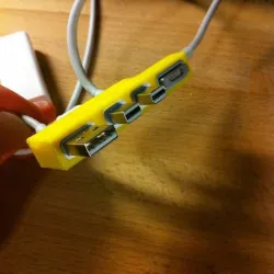 Cable tidy for 15 inch Retina Macbook Pro in OpenSCAD