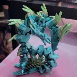 Get Your Hands on a Unique 3D Printed Articulating Feather Dragon – Buy Now!