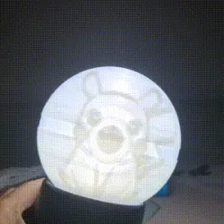 Pikachu sitting in a Pokeball Night Lamp