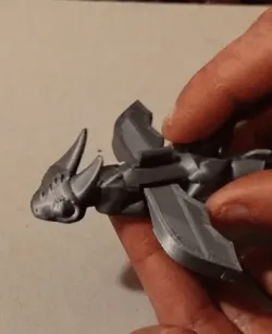 Baby dragon trying to fly.