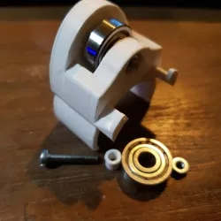 Filament holder with bearring