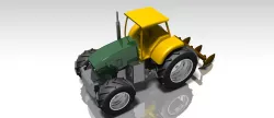 Agricultural tractor with mold board plough