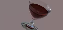 Cup with fresh red wine