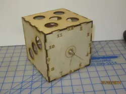 Dice/cube Clock.  Laser cut and engraved clock on a dice-cube.