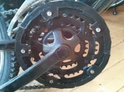 Its a replacement guard for the chain on a bike