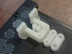 Parametric Prusa Y-axis belt tensioner with ram (wall-mounted)