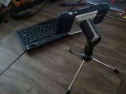 Smartphone holder with desktop stand and mic stand adapter