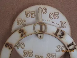 Gear Clock.  New design style. Minute face is the whole cutout of hour wheel gear.  Minute hand is traditional type for easier reading. Stencil cut.