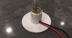 Flashlight light bulb base (incandescent)
