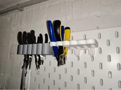 Skadis holder for nippers and scissors