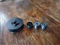 Typewriter ribbon spool center