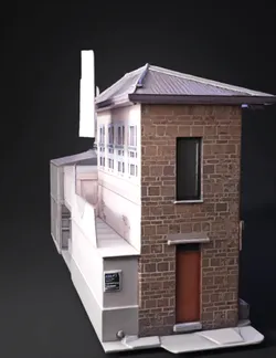 brick two story building with brown brick walls red door small windo