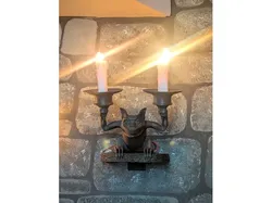 haunted mansion stretching room gargoyle sconce lamp