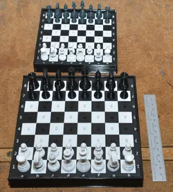 Medium size chess set with MMU board, container base, and twist-lock pieces