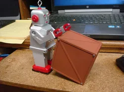 Deluxe, Waking / Rolling "Box Boy" robot.