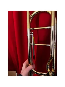 Trombone pencil holder