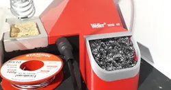 Soldering iron tip cleaner