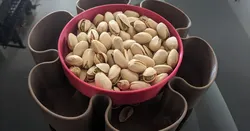 Snacks serving bowl with waste compartment