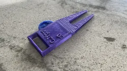 Golf divot tool with puck