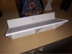 Wall shelf for stackable boxes