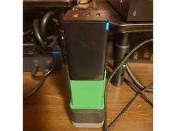 Anti-wobble shroud for European to US wall outlet adapter