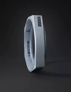 gray circular ring with vented slots ring device smooth plastic text