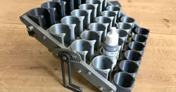 Folding paint rack for 25mm bottles.
