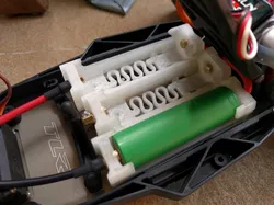 High current 18650/21700 holders with integrated spring