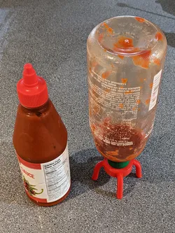 Upside down condiment holder