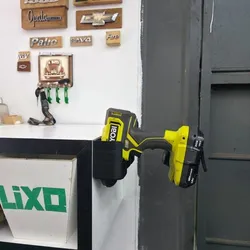 Universal wall drill holder