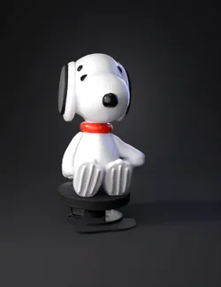 Snoopy dog figurine with red collar sitting on a black pedestal