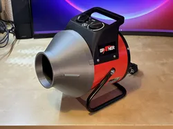 Engine heater reducer for conduit hose