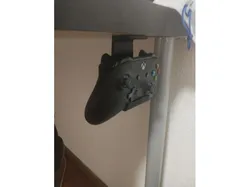 Xbox One controller under table holder