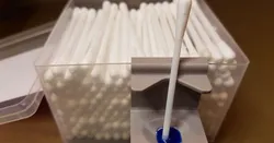 Glue holder for q-tip box