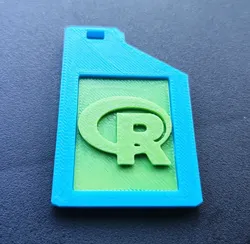 keychain with the R programming language logo
