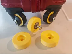 Travel suitcase wheel with tire and barring
