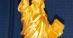 Statue of Liberty with base building and text