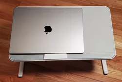 Stopper for laptop stand / tray