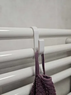 Towel hook for bathroom radiator